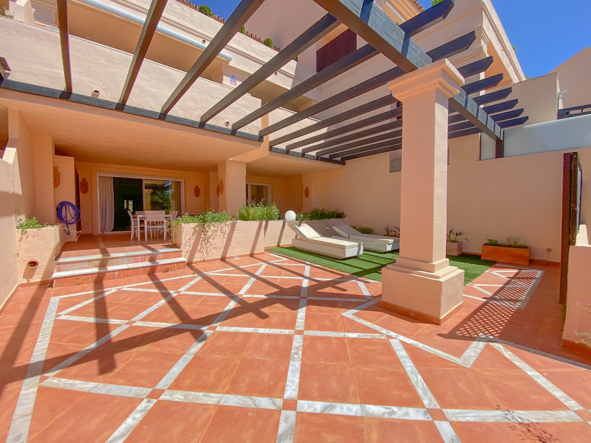 Ground Floor Apartment in Nueva Andalucía — photo 1 of 31