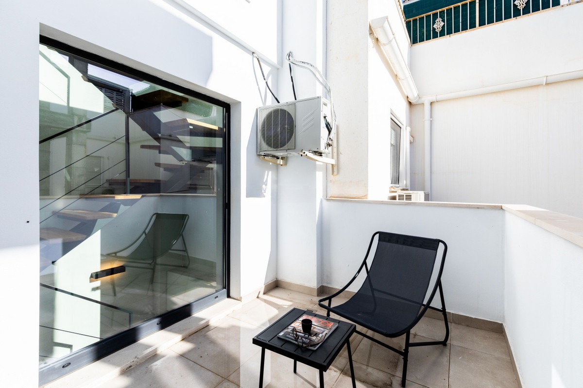 Townhouse in Málaga — photo 1 of 23